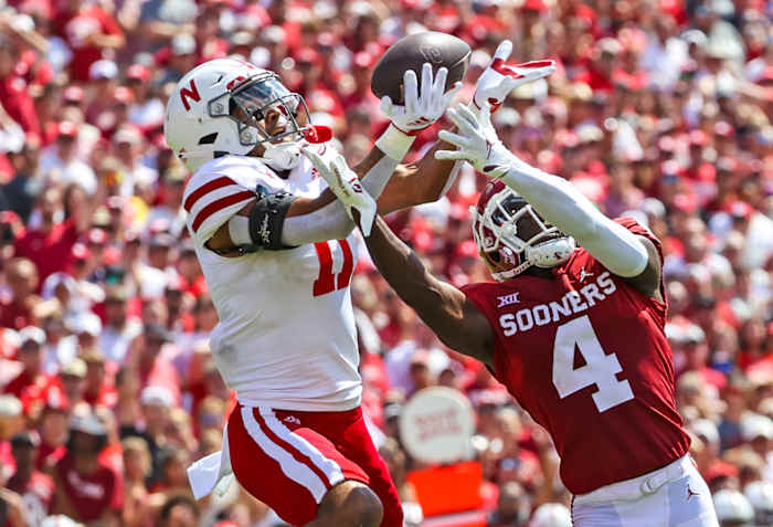 Sep 18, 2021; Norman, Oklahoma, USA; Nebraska Cornhuskers cornerback Braxton Clark (11) breaks up a pass intended for Oklahoma Sooners wide receiver Mario Williams (4) during the fourth quarter at Gaylord Family-Oklahoma Memorial Stadium.